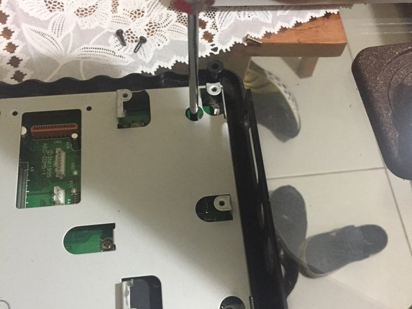 SNK Neo Geo CD Teardown, step 11: crwdns2935265:011crwdnd2935265:02crwdnd2935265:03crwdne2935265:0