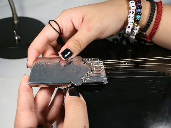 How to Replace the Strings on your Rogue RM-100A A-Style Mandolin: step 9, image 1 of 1