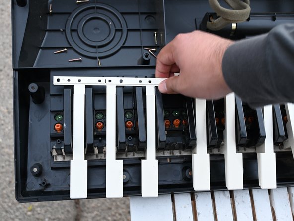 How to Fix Unresponsive Keys for an Optimus Concertmate 980: step 7, image 2 of 3