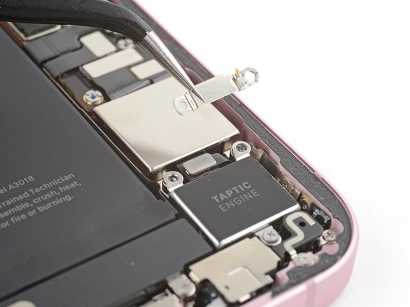 iPhone 15 Taptic Engine Replacement, Install the Taptic Engine connector cover: step 33, image 1 of 2