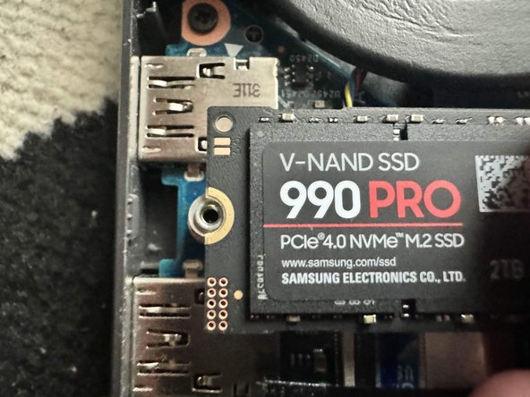 ROG Strix G16 (G614J) M.2 SSD Replacement, Screwing In 2/2: crwdns2935265:08crwdnd2935265:02crwdnd2935265:03crwdne2935265:0