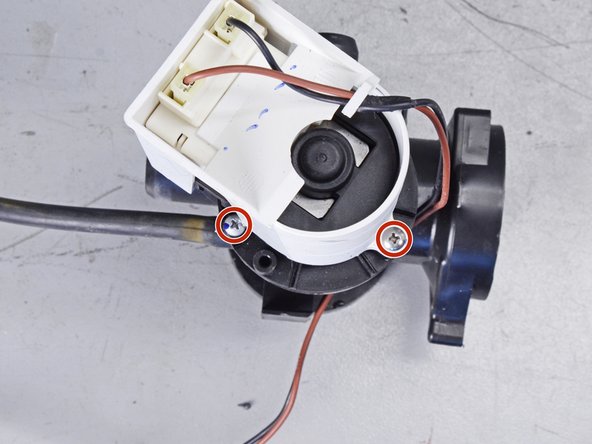 LG Front Load Washing Machine Drain Pump Motor Replacement, Unfasten the pump motor: crwdns2935265:039crwdnd2935265:02crwdnd2935265:02crwdne2935265:0