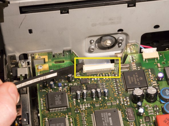 Disassembling Audi Navigation Plus unit: step 13, image 2 of 3