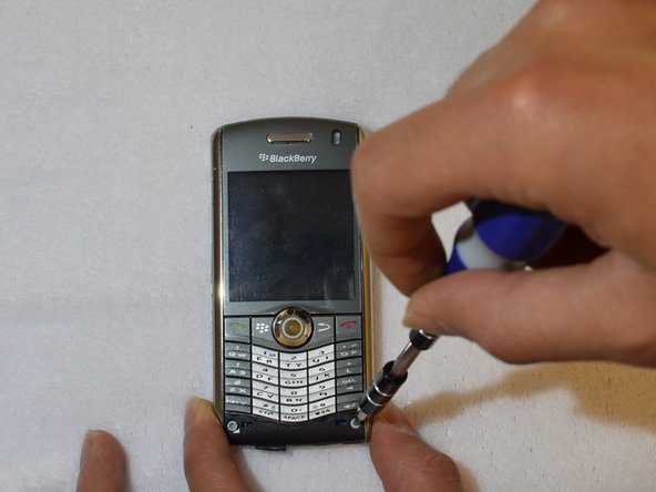 Blackberry 8110 Camera Replacement, Removng the screws from the front side.: crwdns2935265:04crwdnd2935265:02crwdnd2935265:02crwdne2935265:0
