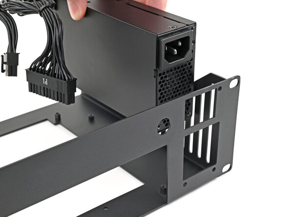 How to Rack Mount your Framework Desktop, Place the power supply: crwdns2935265:01crwdnd2935265:01crwdnd2935265:03crwdne2935265:0