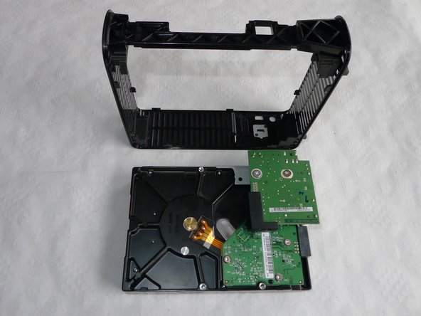 Disassembling Western Digital Essentials HD Anti-vibration rubber pieces, Disassembling Western Digital Essentials HD Hard Drive: crwdns2935265:05crwdnd2935265:02crwdnd2935265:02crwdne2935265:0