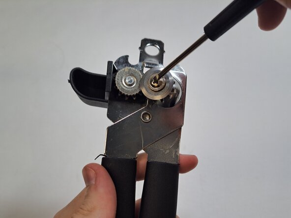 Manual Top-Cut Can Opener Cutting Wheel Replacement: crwdns2935265:05crwdnd2935265:02crwdnd2935265:03crwdne2935265:0