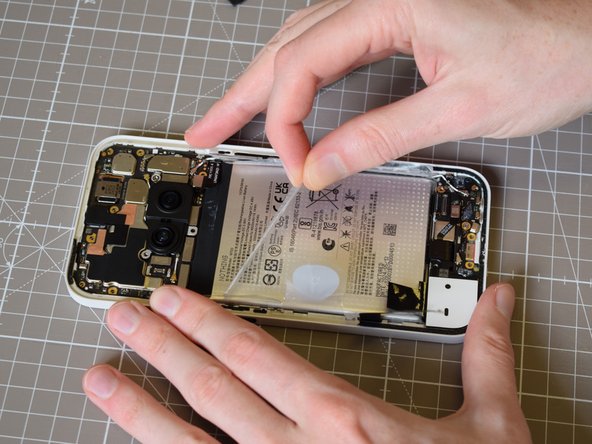 Nothing Phone (2a) Battery Replacement, Pull all stickers surrounding the battery, in order: crwdns2935265:018crwdnd2935265:03crwdnd2935265:03crwdne2935265:0