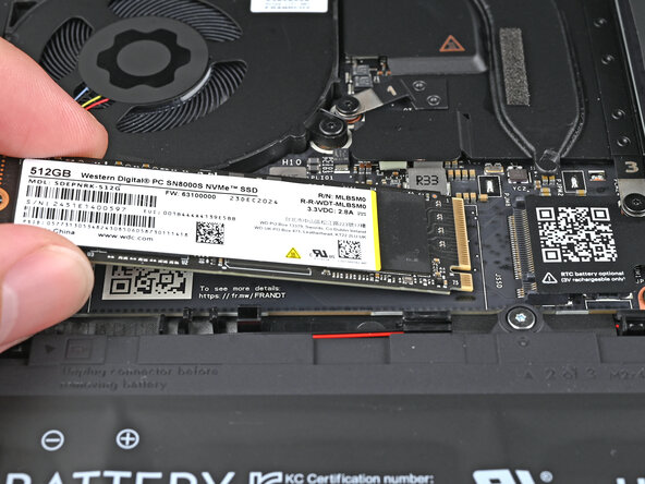 Framework Laptop 13 DIY Edition Quick Start Guide, Install the SSD: step 7, image 1 of 2