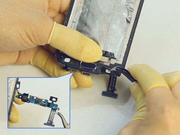 Samsung Galaxy S6 Teardown, Release The Charging Port Assembly.: crwdns2935265:010crwdnd2935265:03crwdnd2935265:03crwdne2935265:0