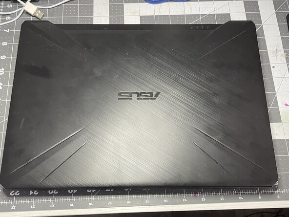 Disassembling Asus FX505G - Inspect Fans - Replace CPU Fan, Turn over laptop and remove screws: adım 1, 2 resimden 1.