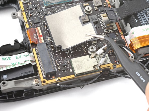 Steam Deck Front Shell Replacement, Remove the Wi-Fi shield tape: crwdns2935265:055crwdnd2935265:03crwdnd2935265:03crwdne2935265:0