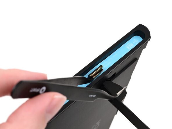 Nintendo Switch 2 Microphone Replacement, Remove the left side sticker: crwdns2935265:09crwdnd2935265:01crwdnd2935265:03crwdne2935265:0