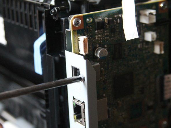Dell c1760nw Clean main mechanics cleaning and making it work, Remove I / O card: step 9, image 3 of 3