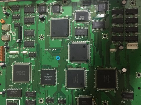 SNK Neo Geo CD Teardown, step 12: crwdns2935265:012crwdnd2935265:03crwdnd2935265:03crwdne2935265:0