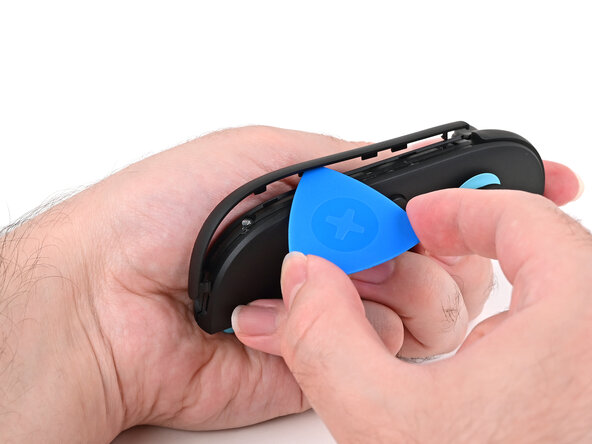 Joy-Con 2 (Left) Battery Replacement, Remove the plastic strip: crwdns2935265:04crwdnd2935265:03crwdnd2935265:03crwdne2935265:0