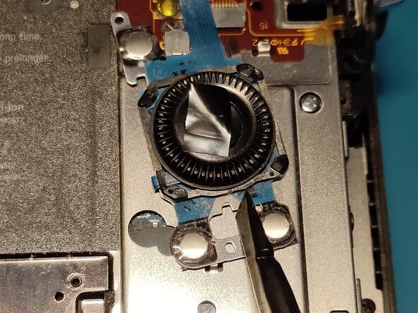 Sony A7 II Top Flex Cable replacement, Removing scroll wheel assembly 2: crwdns2935265:013crwdnd2935265:02crwdnd2935265:02crwdne2935265:0