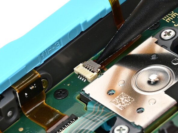 Joy-Con 2 (Left) Joystick Replacement, Disconnect the trigger board: crwdns2935265:022crwdnd2935265:02crwdnd2935265:03crwdne2935265:0