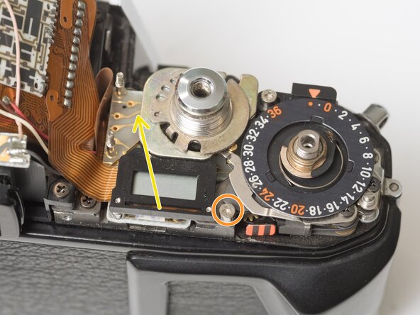 Pentax Super Program Front Lens Board Removal, Detach mode dial unit: crwdns2935265:012crwdnd2935265:02crwdnd2935265:03crwdne2935265:0