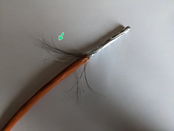 How to strip Cat.7 S/FTP PiMF Ethernet Cable, Pull back the braided shield: crwdns2935265:03crwdnd2935265:02crwdnd2935265:03crwdne2935265:0