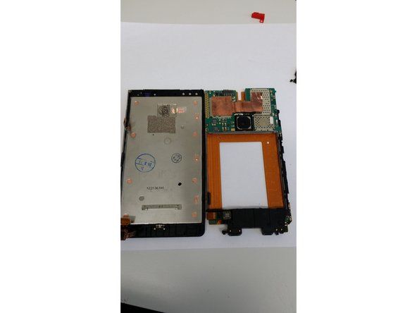 Nokia Lumia 920 Screen Replacement, Remove the cover of the motherboard: crwdns2935265:08crwdnd2935265:03crwdnd2935265:03crwdne2935265:0