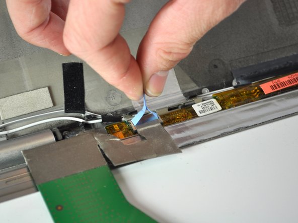 Dell Inspiron 1420 Display Replacement, Removing the Power Connector Cable: crwdns2935265:05crwdnd2935265:02crwdnd2935265:02crwdne2935265:0