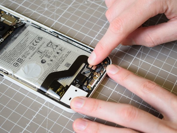 Nothing Phone (2a) Battery Replacement, Reconnect the flex cable on top leading to the sub board: crwdns2935265:022crwdnd2935265:02crwdnd2935265:03crwdne2935265:0