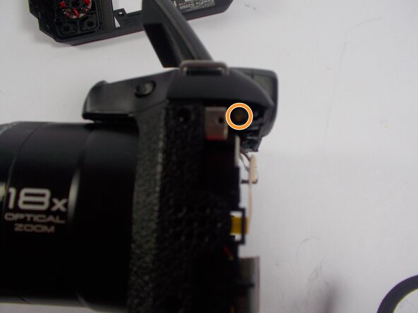 Fujifilm FinePix S2980 Flash Mechanism Latch Spring Replacement, Flash Mechanism Latch Spring: crwdns2935265:03crwdnd2935265:02crwdnd2935265:03crwdne2935265:0