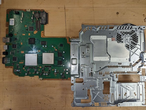 PlayStation 3 Slim Thermal Paste Replacement, Clean off the old thermal paste: crwdns2935265:025crwdnd2935265:03crwdnd2935265:03crwdne2935265:0