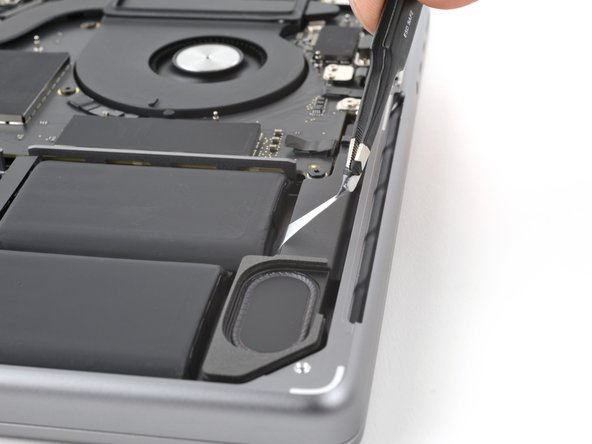 MacBook Pro 14" Late 2023 (M3) Battery Replacement, Remove the stretch release adhesive: crwdns2935265:031crwdnd2935265:02crwdnd2935265:03crwdne2935265:0