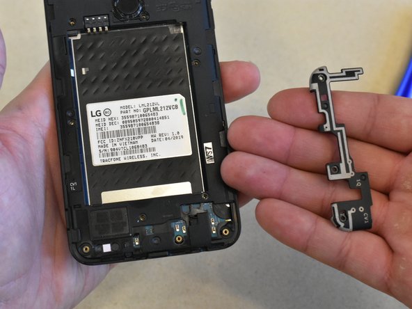 LG Rebel 4 LTE Disassembly, Remove Charging Port Cover: crwdns2935265:04crwdnd2935265:02crwdnd2935265:02crwdne2935265:0