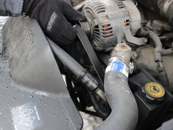 2003 Jeep Grand Cherokee Serpentine Belt  Replacement: crwdns2935265:05crwdnd2935265:03crwdnd2935265:03crwdne2935265:0