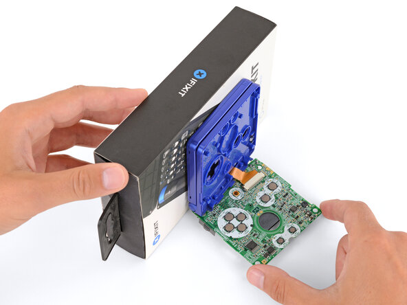 How to Reshell Your Game Boy Advance SP, Prop up the main body: crwdns2935265:014crwdnd2935265:03crwdnd2935265:03crwdne2935265:0