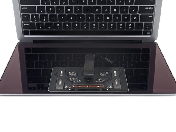 MacBook Pro 13" 2022 (M2) Battery Replacement, Remove the trackpad: crwdns2935265:020crwdnd2935265:03crwdnd2935265:03crwdne2935265:0
