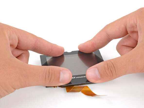 Nintendo Game Boy Advance SP Screen Lens Replacement, Install the new lens: crwdns2935265:032crwdnd2935265:03crwdnd2935265:03crwdne2935265:0