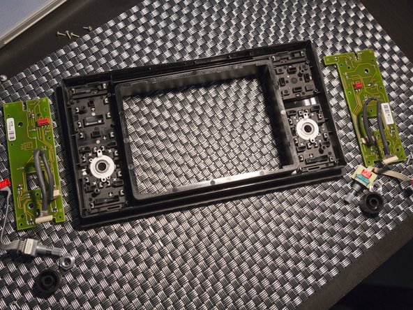 Disassembling Audi Navigation Plus unit, Removing the button logic boards: step 21, image 3 of 3