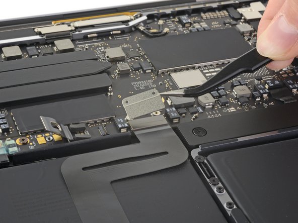 MacBook Pro 13" 2022 (M2) Thunderbolt Ports Replacement, Remove the trackpad cable bracket: step 21, image 2 of 2