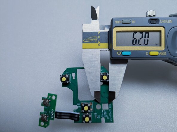 Logitech Lift Teardown, Close-Ups of Switch Board and Switch Dimensions: crwdns2935265:021crwdnd2935265:03crwdnd2935265:03crwdne2935265:0