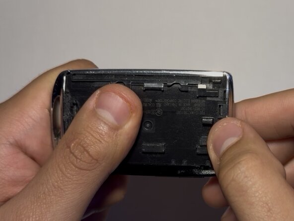 Mazda CX-30 Key Fob Battery Replacement: step 2, image 2 of 3