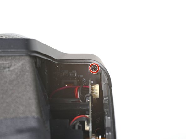 Polaroid I-2 Front Cover Replacement, Unfasten the top cover: crwdns2935265:024crwdnd2935265:03crwdnd2935265:03crwdne2935265:0