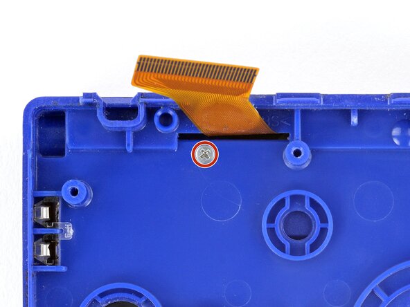 How to Reshell Your Game Boy Advance SP, Remove the hinge cover screw: crwdns2935265:022crwdnd2935265:02crwdnd2935265:03crwdne2935265:0