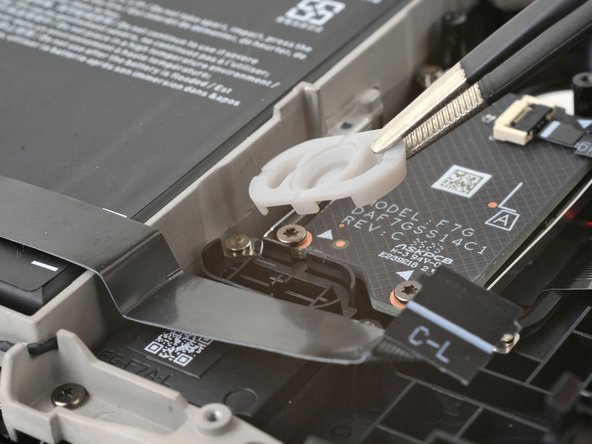 Steam Deck OLED Left Touchpad Replacement, Remove the Steam button membrane: step 22, image 2 of 2