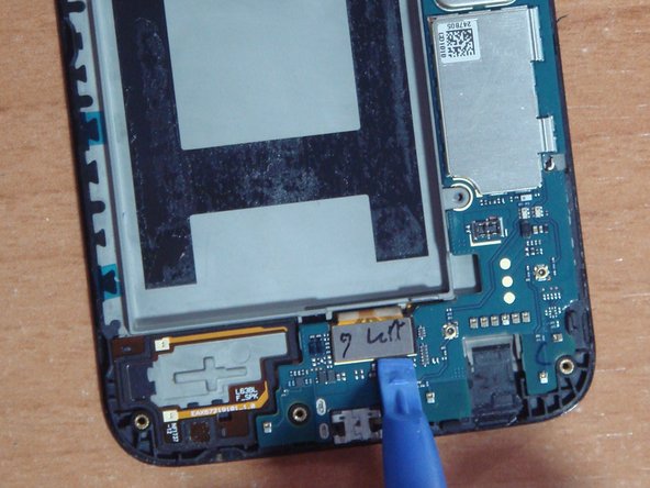 Reemplazo conjunto display LG X Power 2 (LG-M320N), Desconexión pantalla y cámaras de la placa base: crwdns2935265:04crwdnd2935265:02crwdnd2935265:03crwdne2935265:0