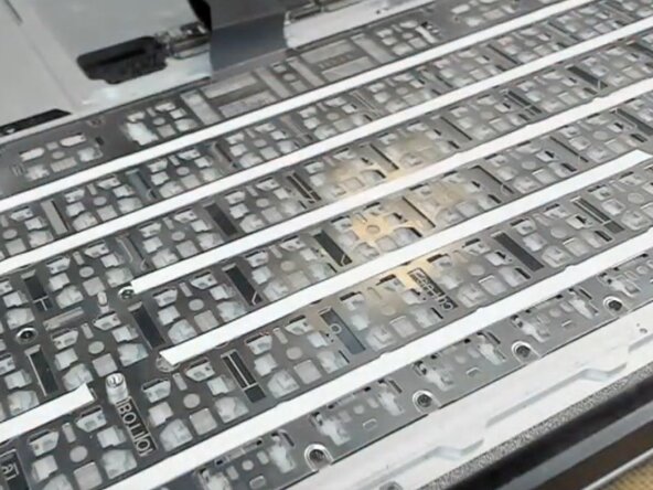 MacBook Air 13" Early 2015 Keyboard Replacement, Installing the backlight: crwdns2935265:07crwdnd2935265:02crwdnd2935265:03crwdne2935265:0