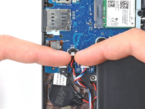 Dell Latitude 7490 CMOS Battery Replacement, Disconnect the CMOS battery: crwdns2935265:09crwdnd2935265:02crwdnd2935265:03crwdne2935265:0