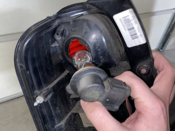 How to Replace a Brake Light for a 2006 Ford Escape Hybrid: step 6, image 1 of 2