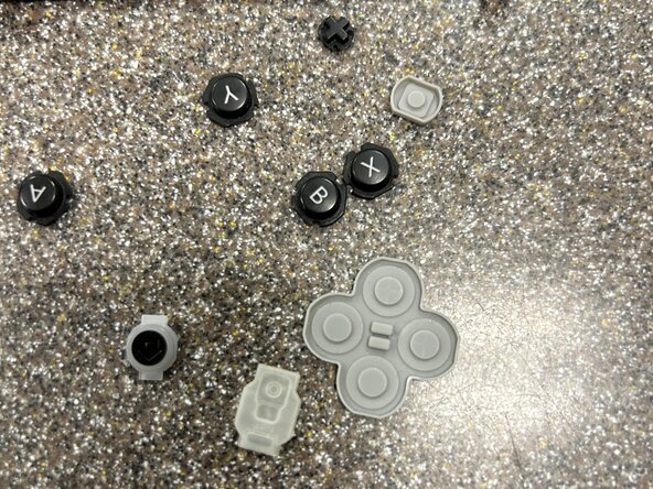 Right Joy-Con Teardown: crwdns2935265:029crwdnd2935265:02crwdnd2935265:02crwdne2935265:0