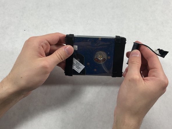 HP Pavilion g7-2023cl Hard Drive Mounting Bracket Replacement, Hard Drive Mounting Bracket: crwdns2935265:08crwdnd2935265:03crwdnd2935265:03crwdne2935265:0