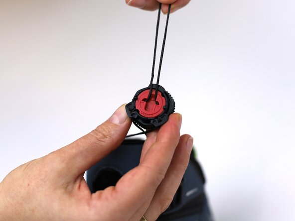 How to Replace a Dial-Lace System in a Hiking Boot, Tighten the lace: crwdns2935265:016crwdnd2935265:03crwdnd2935265:03crwdne2935265:0