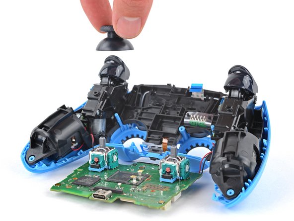 DualSense Controller v2 Joystick Cover Replacement, Remove the joystick covers: step 26, image 3 of 3